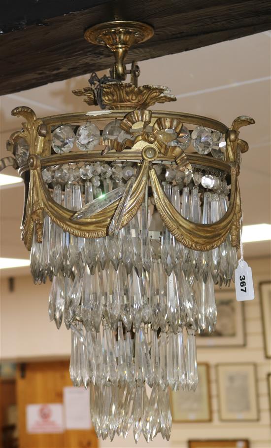 A gilt metal ceiling shade